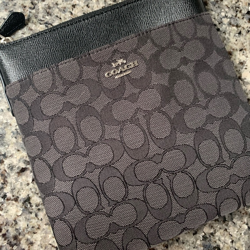 Coach Messenger Bag.